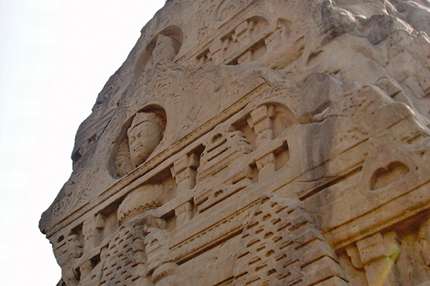 Masroor's carving of a deity looks remarkably like the Buddha