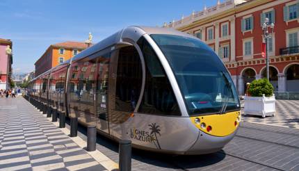 A tram passing through the Place Massena square in Nice, France