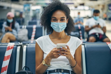 A woman waiting for her flight