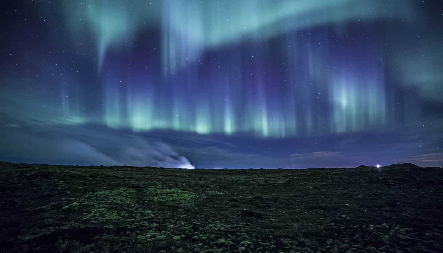 Top 5 places to experience supernatural forces - Aurora over a lava field