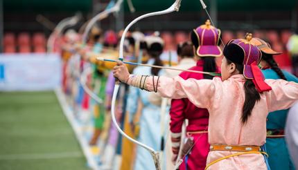 Naadam Festival-Women taking part in archery