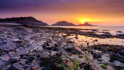 Sunrise over the Mumbles lighthouse